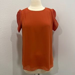 Pleated flutter sleeve blouse